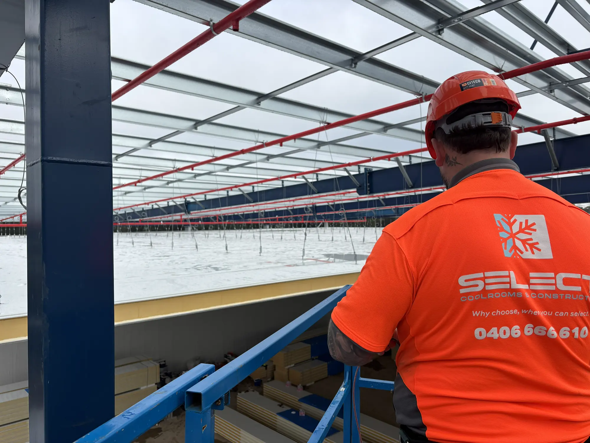 Select Coolrooms crew working on an insulated panel installation